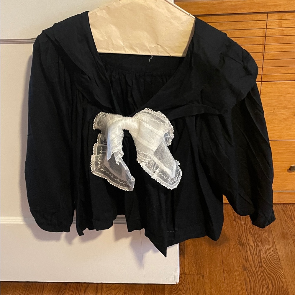 THE GREAT. Navy Blouse with White Accents